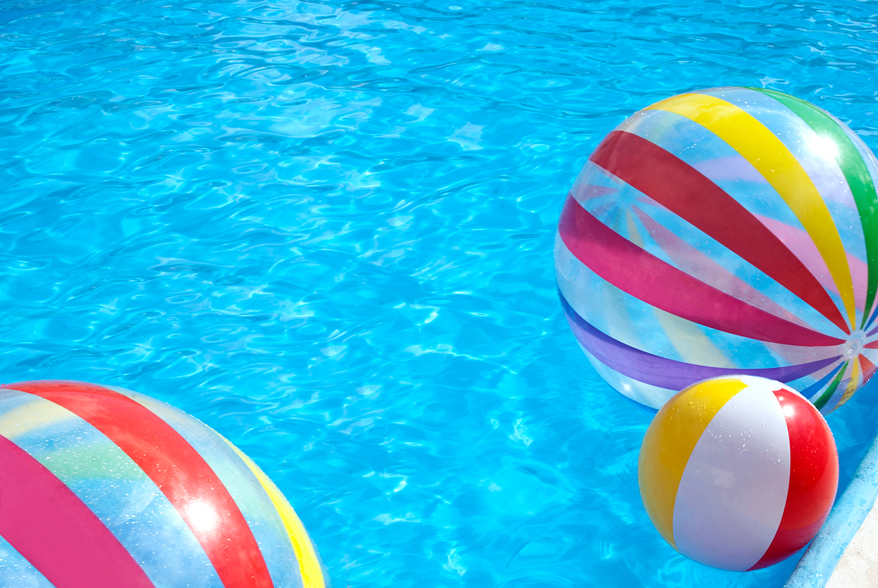 Pool balls and pool toys floating